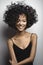 Beautiful woman with afro curls hairstyle