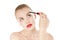 Beautiful woman applying cosmetics mascara brush.