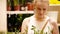 Beautiful woman arranging ornamental bamboo