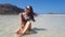 Beautiful woman in bikini on the Balos beach. Crete, Greece