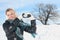 Beautiful woman on the blue sky of Quebec winter