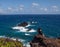 Beautiful Woman on a bluff on the Hawaii Coast