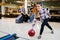 Beautiful woman bowling with friends