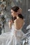 Beautiful woman bride in white wedding dress, romantic look, woman resting. Fabulous princess. elegant lady with long hair. Loft