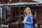 Beautiful woman businesswoman in a blue suit with a smartphone in her hands, teleworking. Soft selective focus