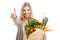 Beautiful woman carrying vegetables