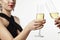 beautiful woman celebrating with friends, champagne in a glasses