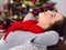 Beautiful woman at Christmas night dreaming