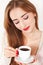 Beautiful Woman with cup of Coffee close up