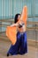 Beautiful woman dancing in arabic costume, oriental or belly dance