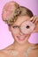 Beautiful woman, donut on head and front of eye