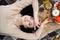 Beautiful woman dreams during a picnic on a background of autumn nature