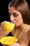 Beautiful woman drinking cup of black tea