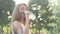 Beautiful woman enjoying drinking water after outdoor workout