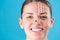 Beautiful Woman Face. Beauty Portrait of young woman brunette smiling, painted lines on the face for cosmetic surgery on