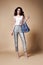 beautiful woman fashion glamour model brunette hair makeup wear silk blouse trousers clothes for every day casual party style