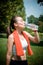 Beautiful woman fitness drinking water