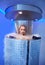 Beautiful woman in a full body cryotherapy camber