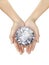 Beautiful woman hand holding a Dazzling diamond on a white isolated background