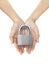 Beautiful woman hand holding a locked padlock on a white isolated background