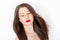 Beautiful woman with healthy gorgeous long hair, natural brunette hairstyle and red lipstick makeup, haircare and beauty