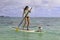 Beautiful woman on her paddle board