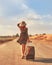 Beautiful woman hitchhiking