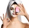 Beautiful woman hold pink face exfoliator brush silicone cleansing device for sensitive normal skin show ok sign