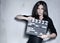 Beautiful woman holding clapperboard