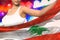 beautiful woman holds Lebanon flag in front on the party lights - flag concept 3d illustration