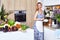Beautiful woman housewife cook prepare in kitchen meal,delicious, tasty diet recipe made from fresh natural organic vegetable
