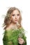 Beautiful woman isolated. Blonde curly, natural make up and spring flowers