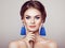 Beautiful Woman with Large Earrings Tassels