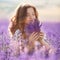 Beautiful woman in a lavender field