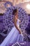 Beautiful woman in lavender field with treble clef and piano throne