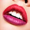 Beautiful woman lips with  red and purple lipstick