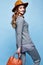 Beautiful woman long blond curly hair wear cashmere wool suit kn