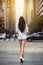 Beautiful woman with long legs walking around New York City street