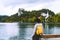 Beautiful woman looking at Lake Bled. Tourist travel in Slovenia, Europe