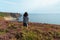 Beautiful woman looking at seascape in Brittany