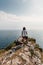 Beautiful woman looking at seascape in Brittany