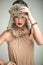 beautiful woman in luxury clothes and fur hat