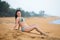 Beautiful woman lying on the sand on the beach in summer. Summer vacation happiness carefree joyful woman