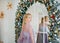 Beautiful woman in the mirror reflected the smiles magically in Christmas interior