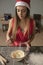 Beautiful woman mixes ingredients for dough, close up