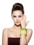 Beautiful woman with multicolored nails and studded bracelet