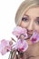 Beautiful woman with phalaenopsis orchids