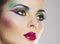 Beautiful woman portrait with bright colourful makeup