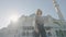 Beautiful woman posing on background of temple. Action. Happy woman dances outside mosque on sunny day. Beautiful woman