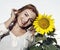 Beautiful woman posing with sunflower, beauty and nature